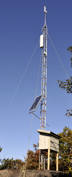 Tower with antennas, solar panel and box Oct 10
